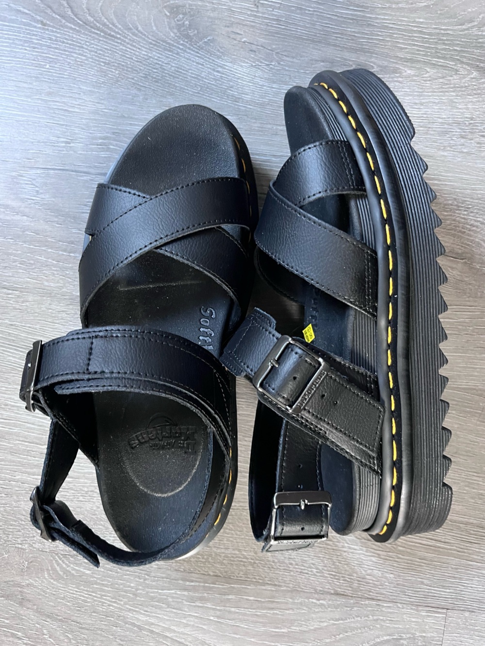 Dr. Martens Black Leather Cross-Strap Sandals with Yellow Stitching